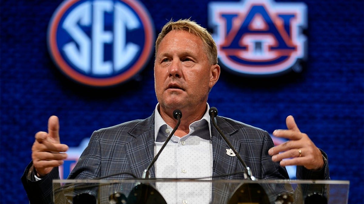 Hugh Freeze speaks during press conference