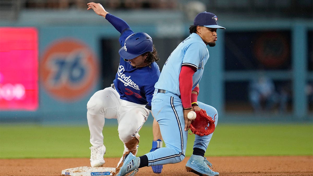 James Outman steals second base