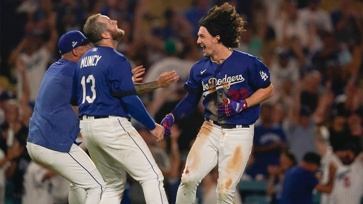 James Outman celebrates with Max Muncy