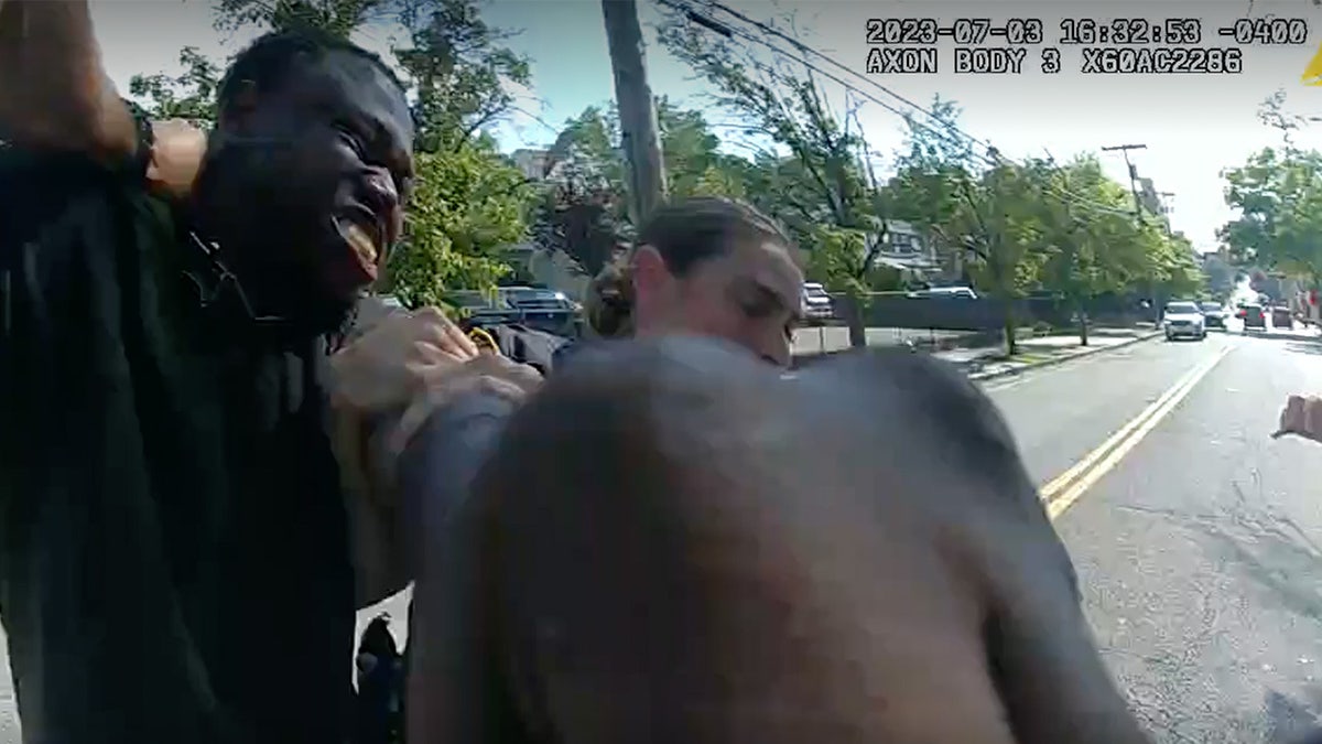 Man shown tussling with police in body cam image