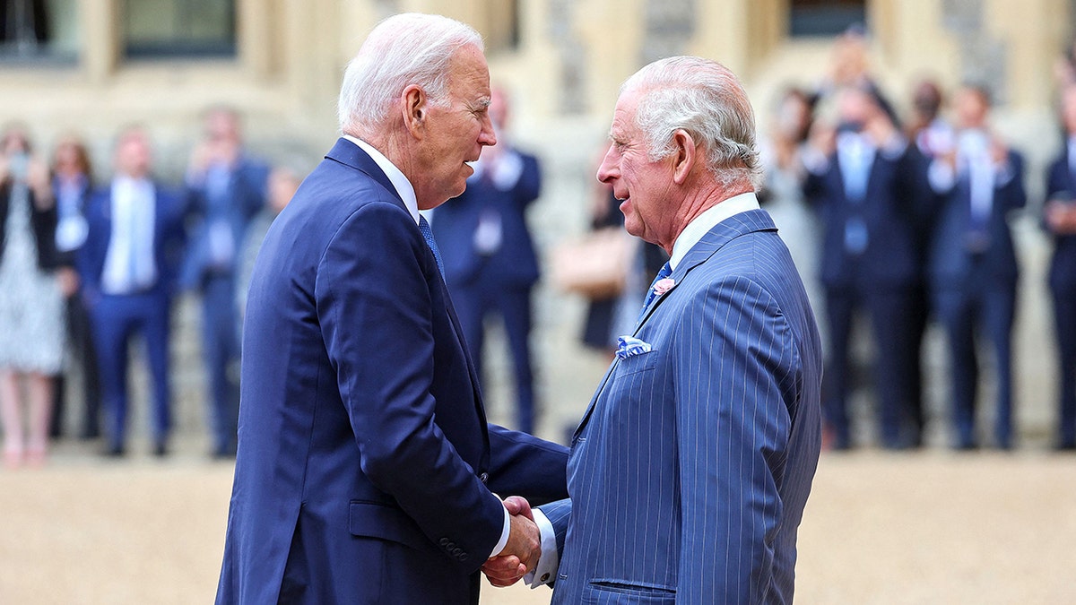 President Biden shakes hands with King Charles III