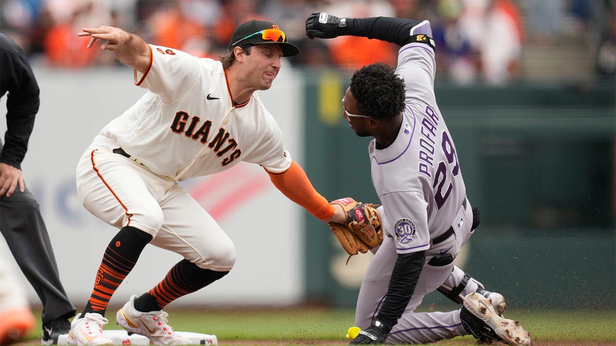 Casey Schmitt tags Jurickson Profar out
