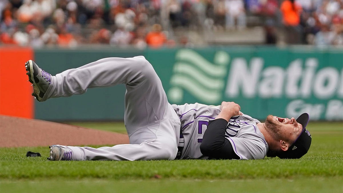 Kyle Freeland lays down in pain
