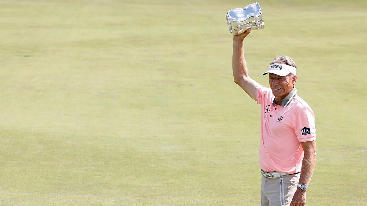 Bernhard Langer poses with trophy