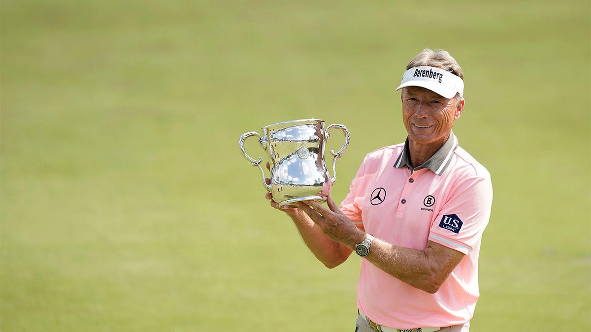 Bernhard Langer poses with trophy