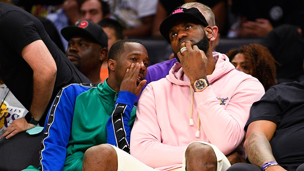 LeBron James and Rich Paul sit courtside during the BIG3 Championship
