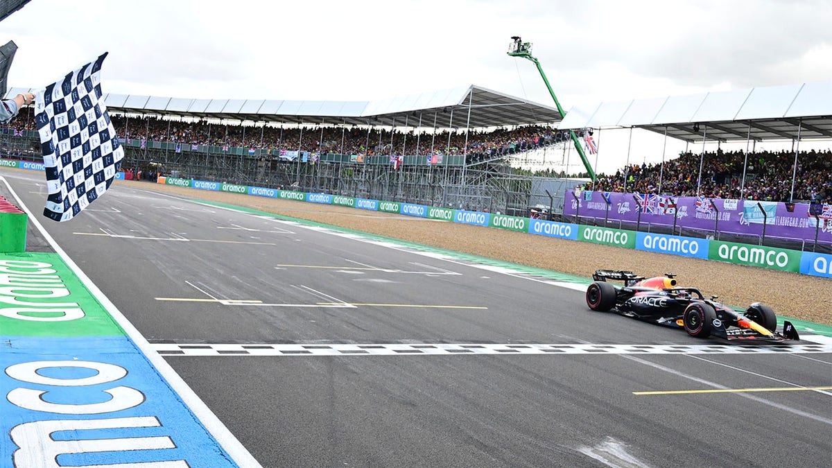 Max Verstappen crosses finish line