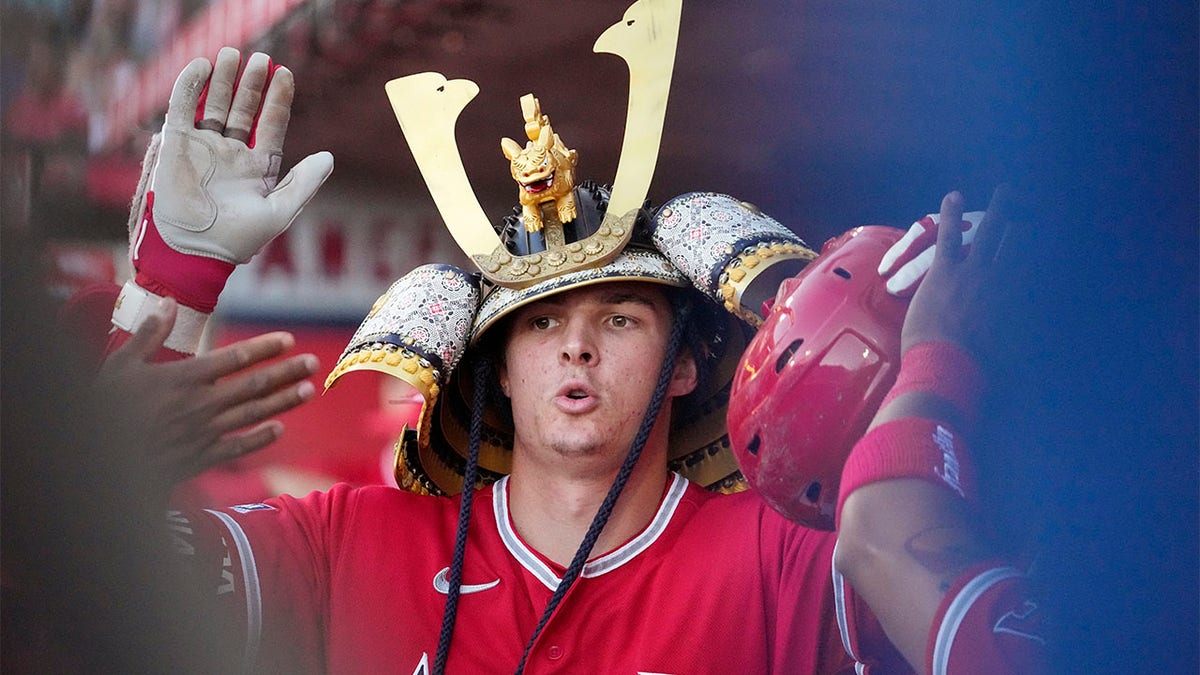 Mickey Moniak celebrates