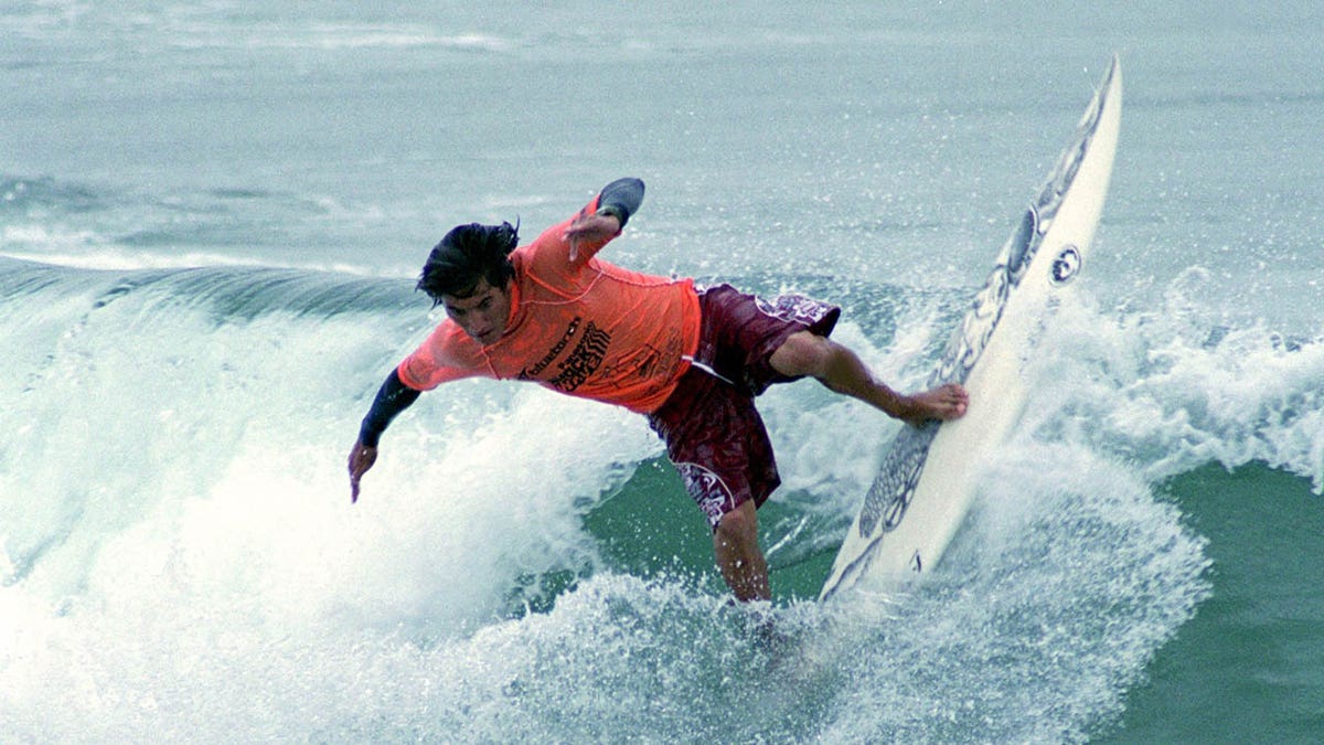 American surfer Mikala Jones during competition in 2000