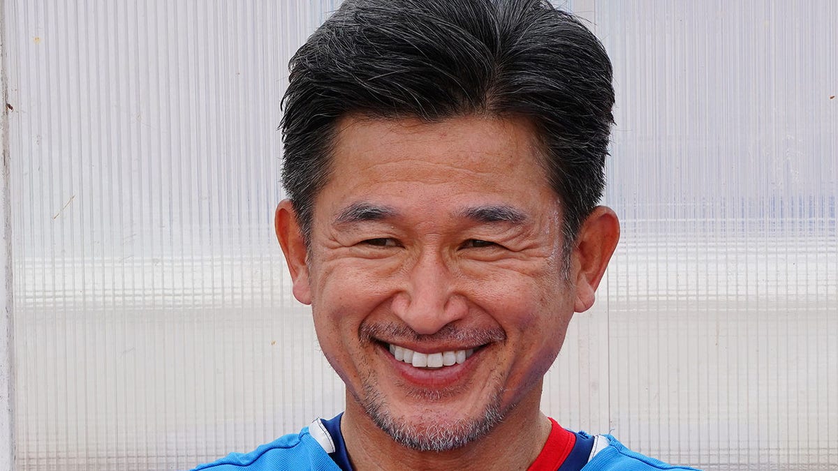 Kazu Miura smiles