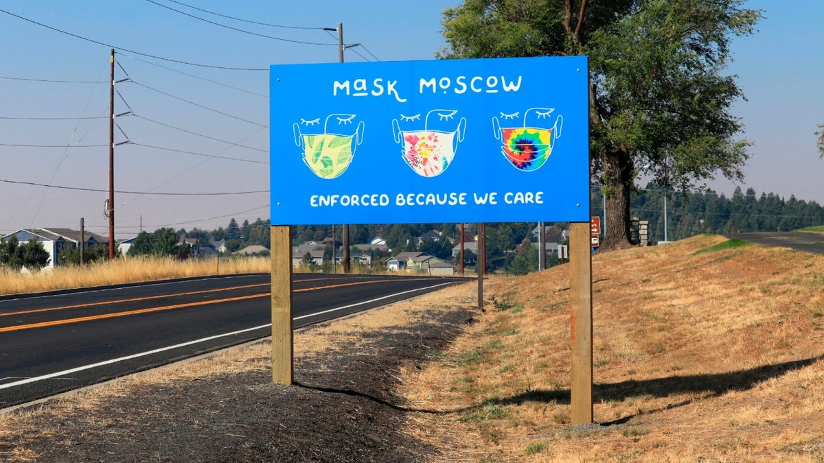 A 'mask moscow' sign along road in Moscow, Idaho