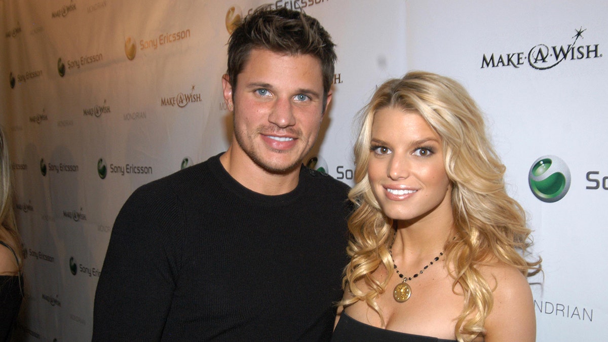 Nick Lachey and Jessica Simpson attend an event