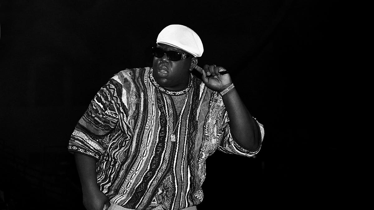 Notorious BIG wears coogi sweater during show in Chicago