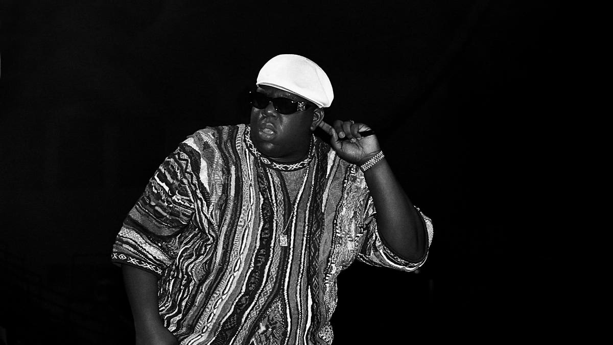 Notorious BIG wears coogi sweater during show in Chicago