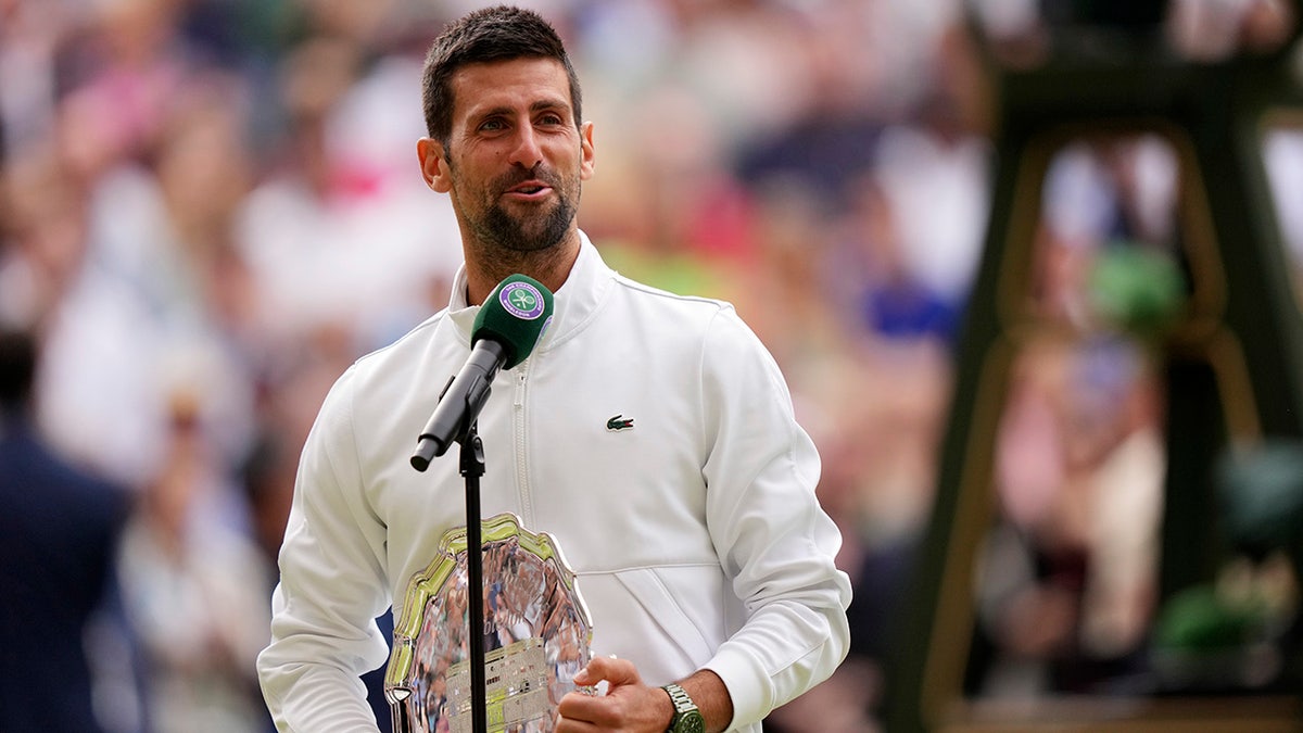 Novak Djokovic talks to crowd