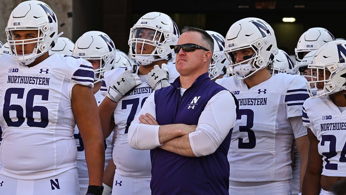 Pat Fitzgerald enters the field