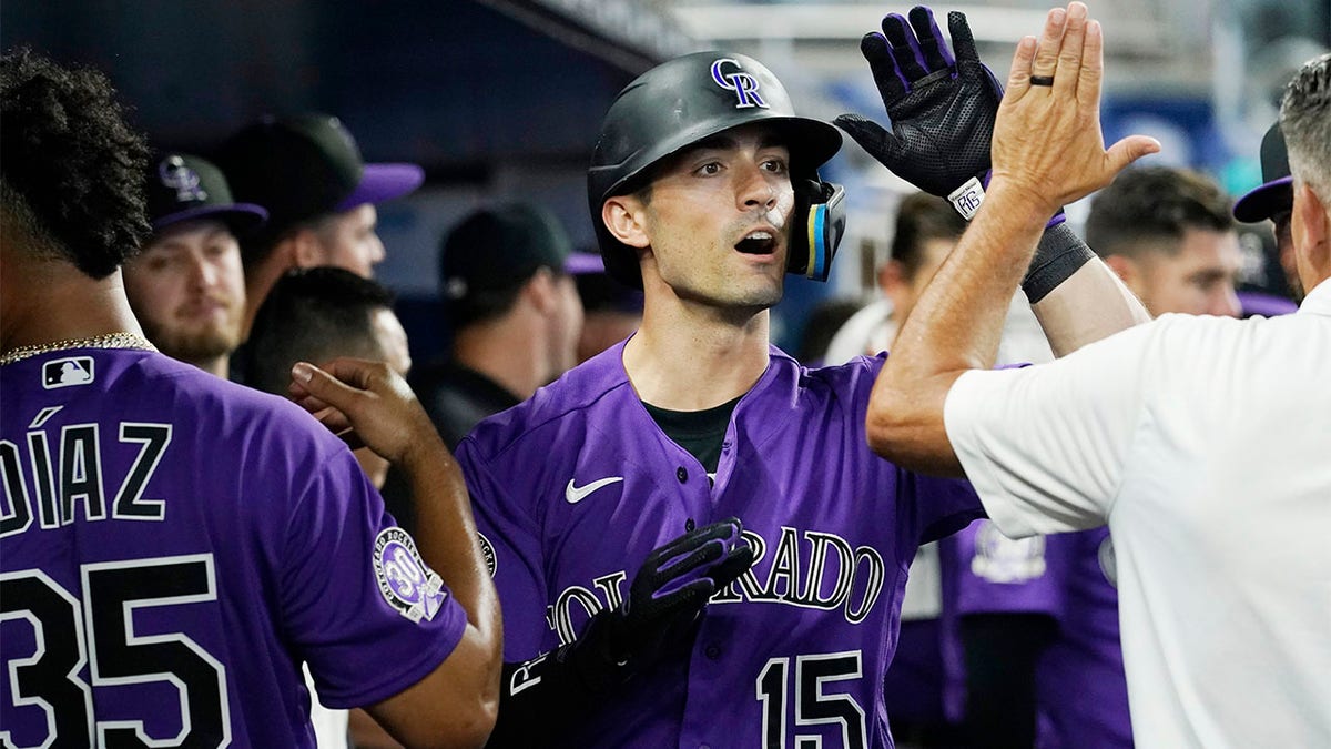 Marlins snap eight-game losing streak with extra-innings victory over  Rockies