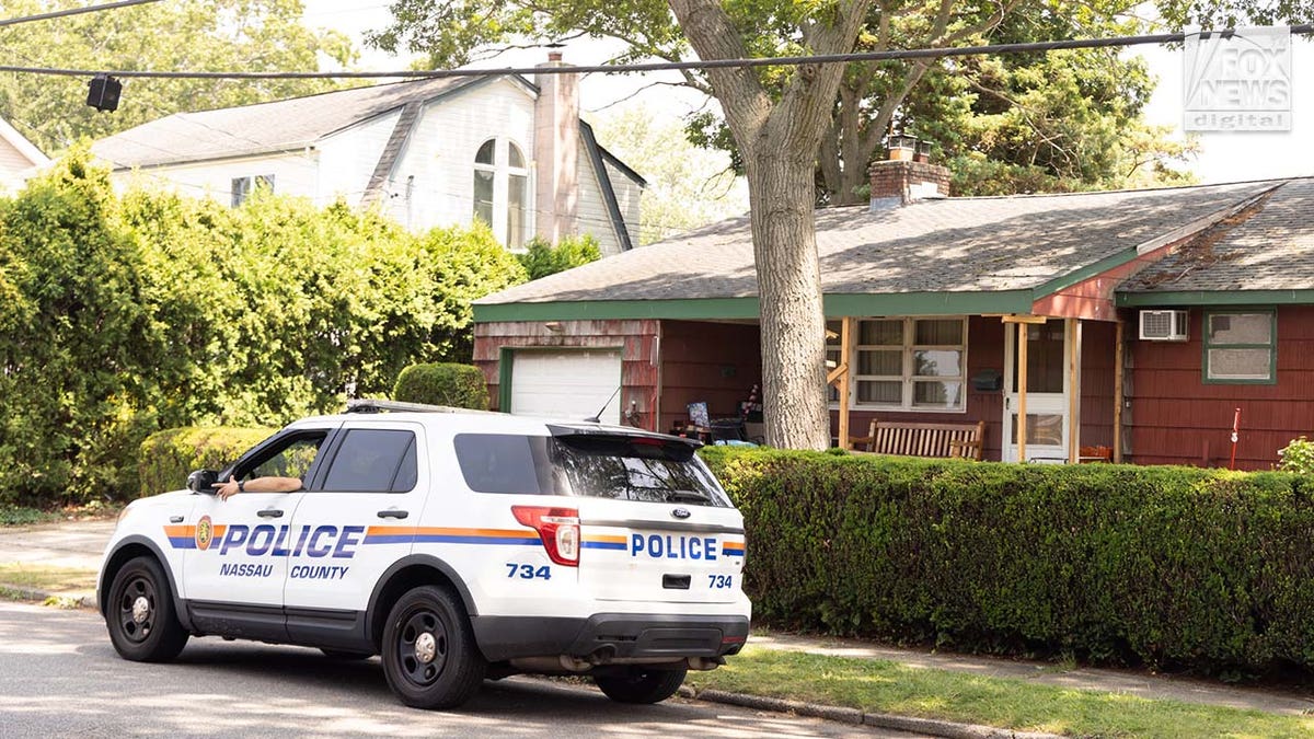 Police outside Rex Heuermann's Long Island home