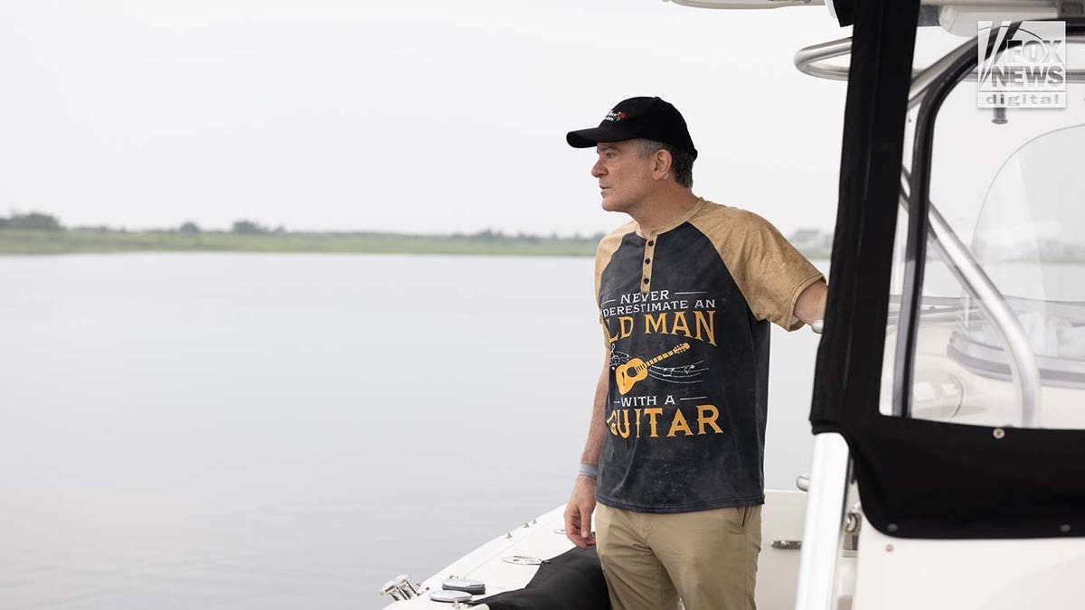 Paul Mauro captains a boat through Gilgo Beach