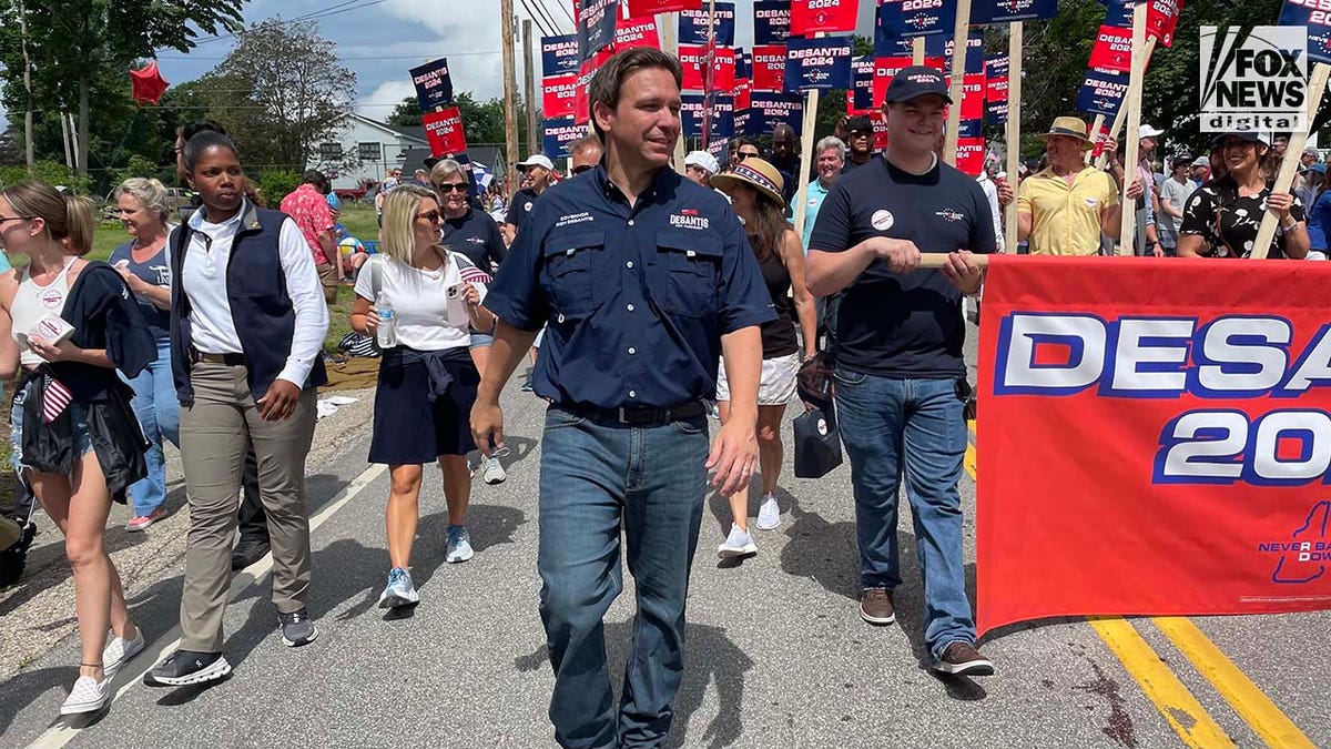 Ron DeSantis greets supporters before an Independence Day parade.