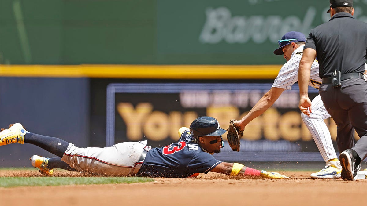 Willy Adames tags out Ronald Acuna Jr