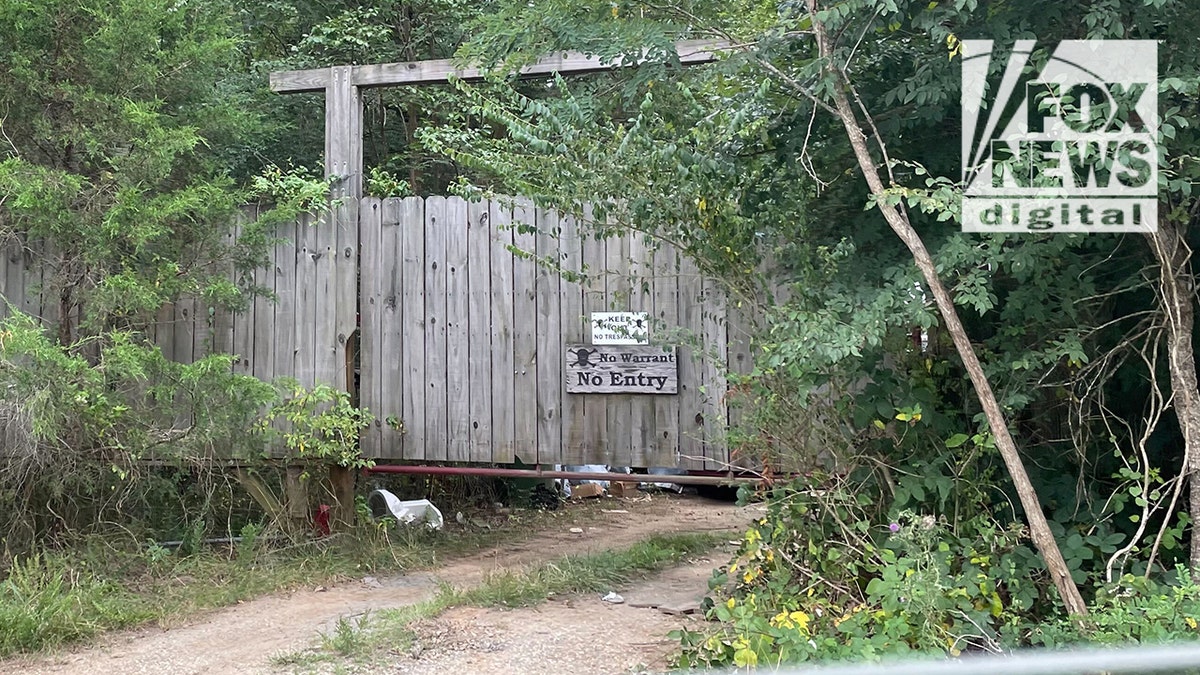 Craig Heuermann's front gate with two 'no trespassing' signs