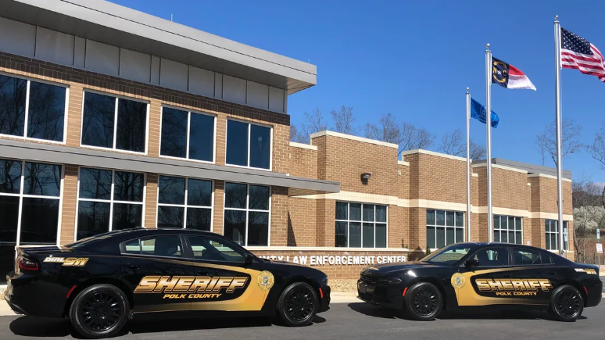 Polk County police cars outside building