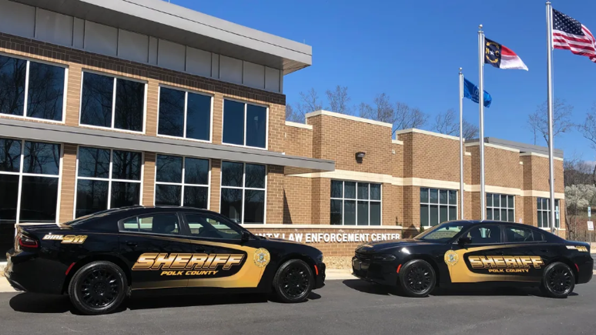 Polk County police cars outside building