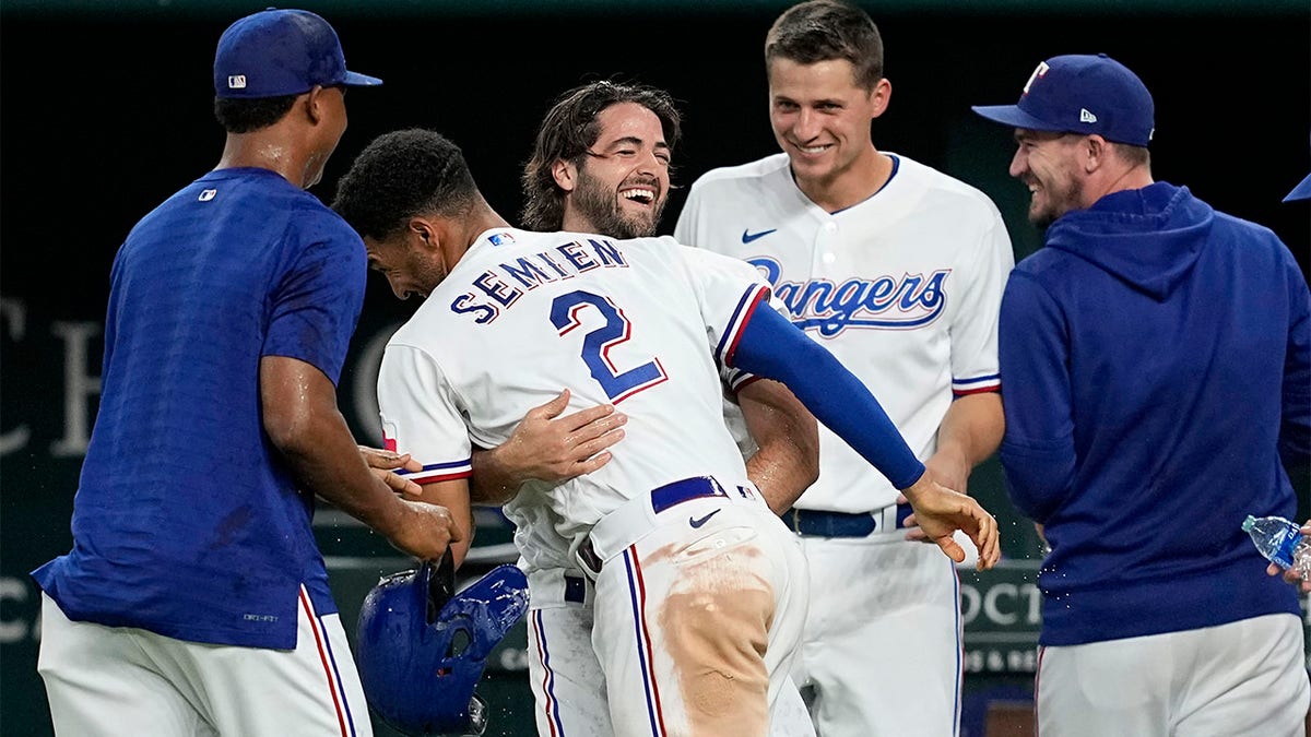 Josh Smith celebrates with teammates