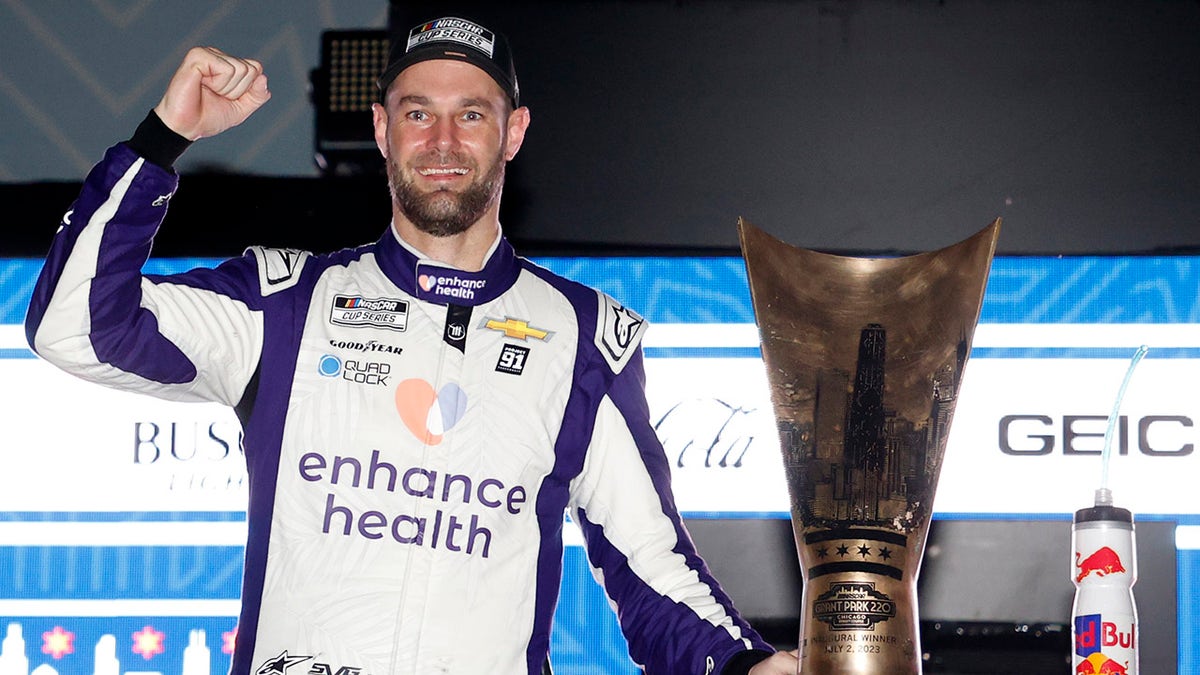 Shane Van Gisbergen with the trophy