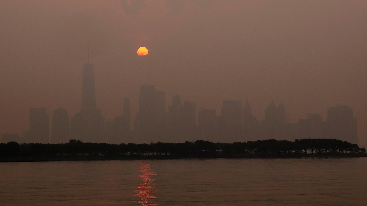 The sun and smokey New York City skies