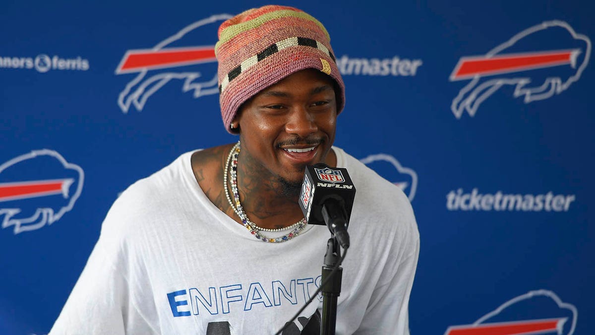 Stefon Diggs speaks to reporters after training camp