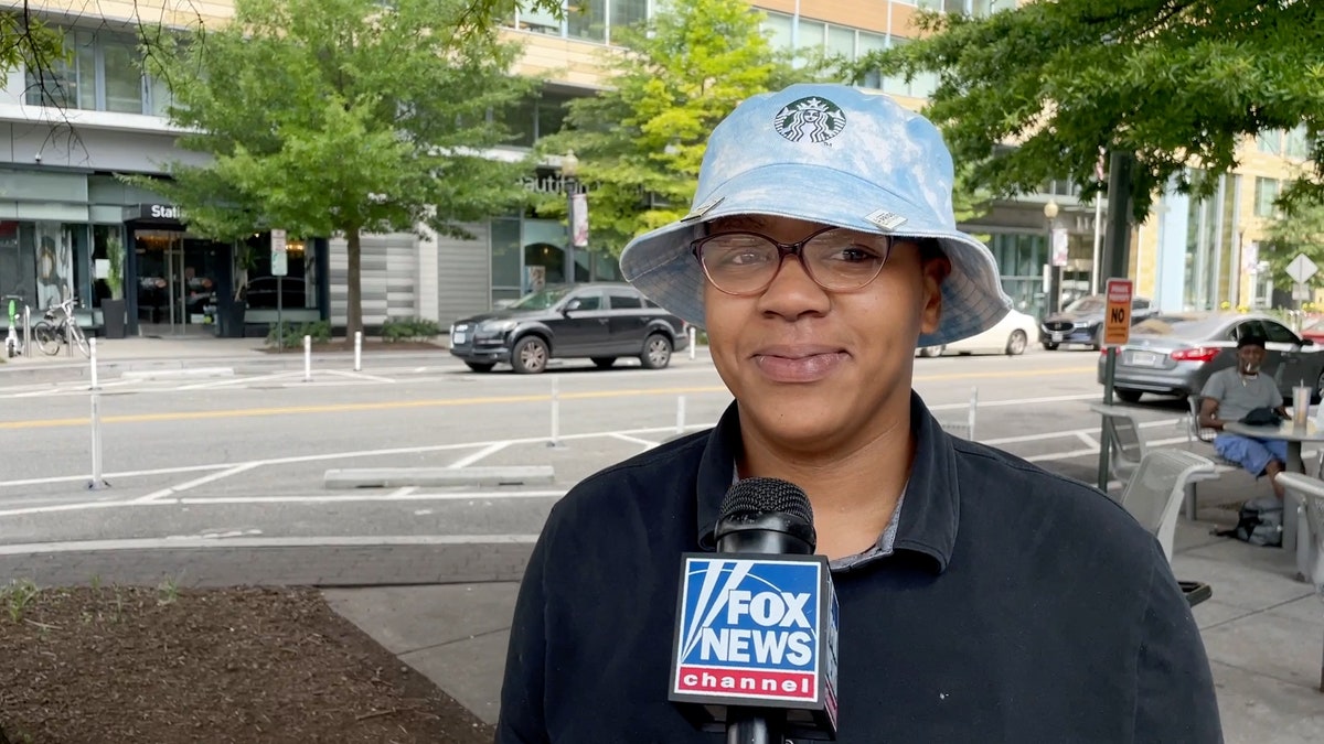 Young person speaks to Fox News on the street.