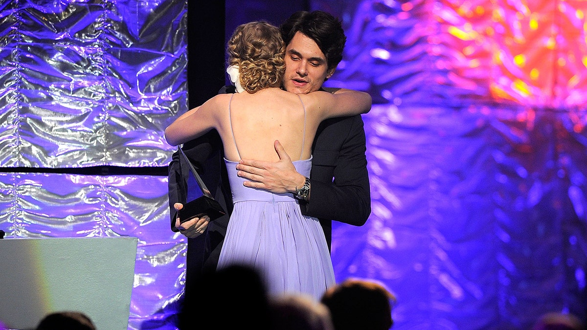 Taylor Swift and John Mayer share a hug