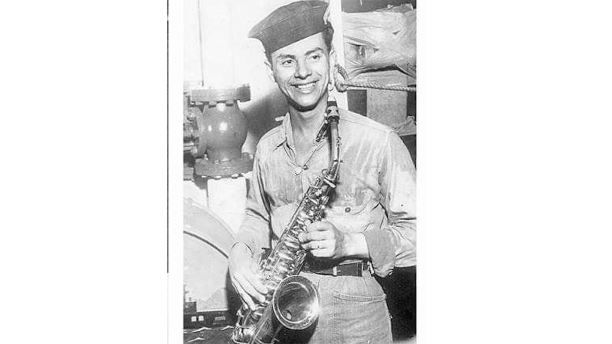 Tito Puente with saxophone