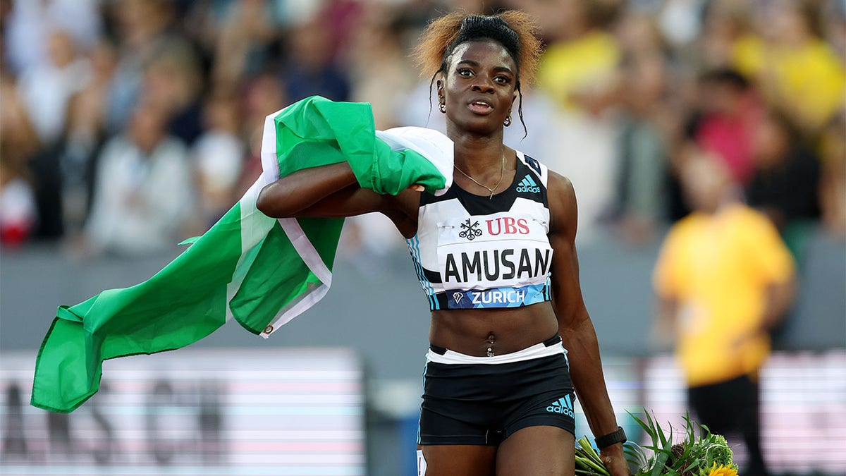 Tobi Amusan celebrates