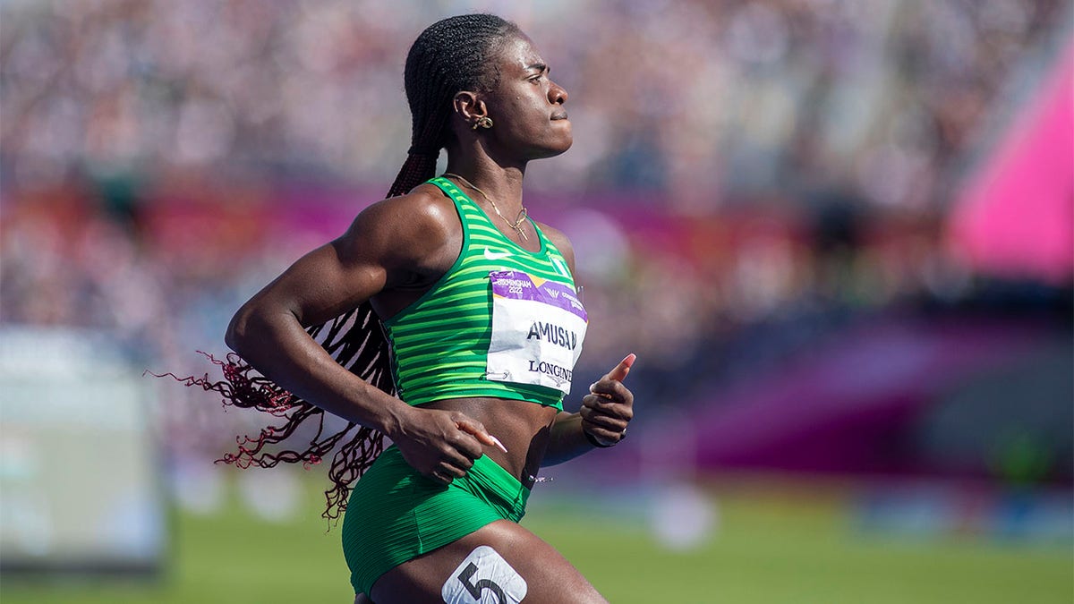 Tobi Amusan runs