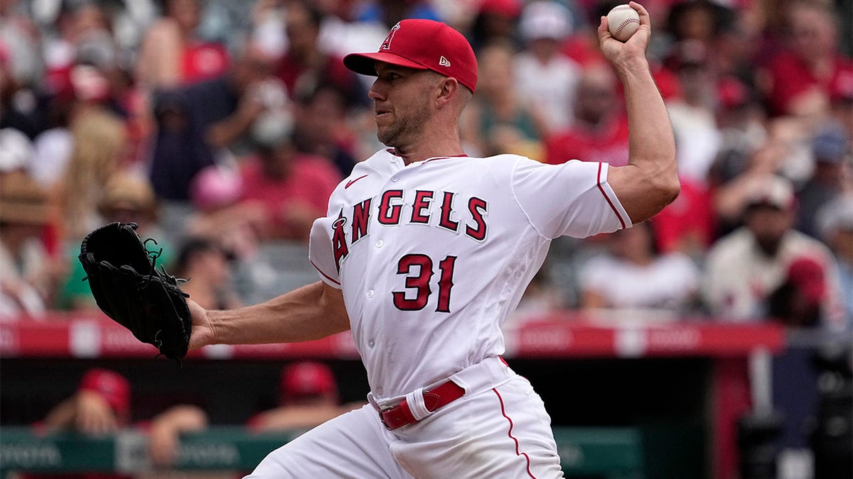 Tyler Anderson throws pitch