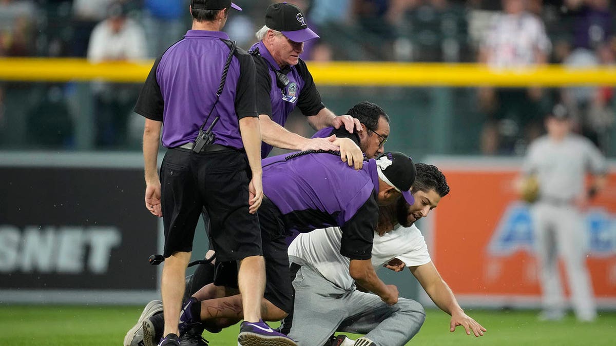 Fan tackled at Coors Field