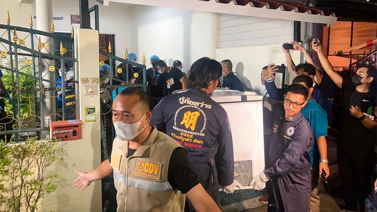 Thailand police carry freezer