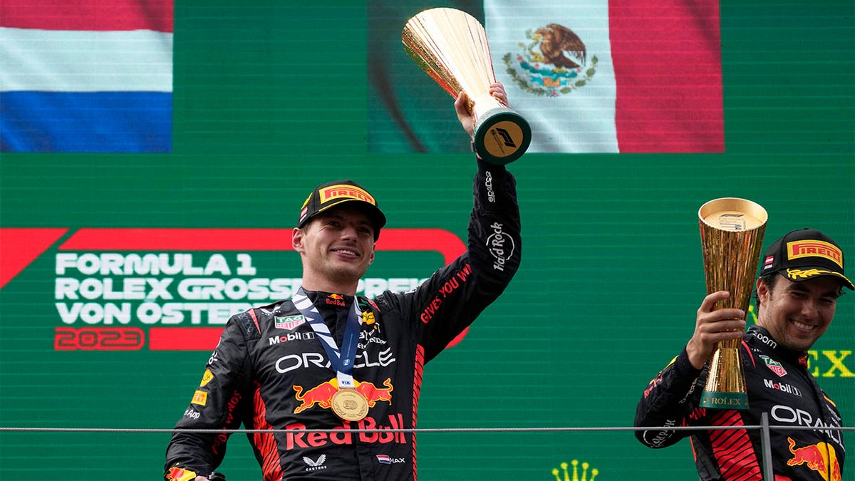 Max Verstappen hoists trophy