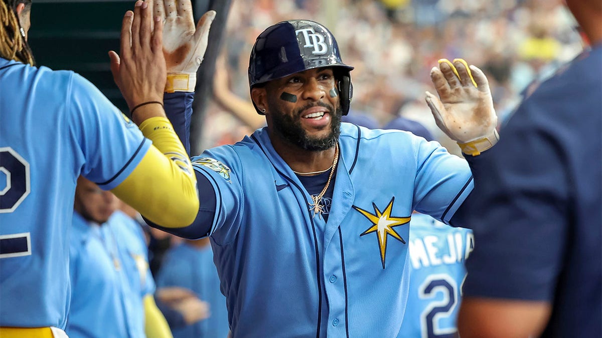 Yandy Diaz celebrates