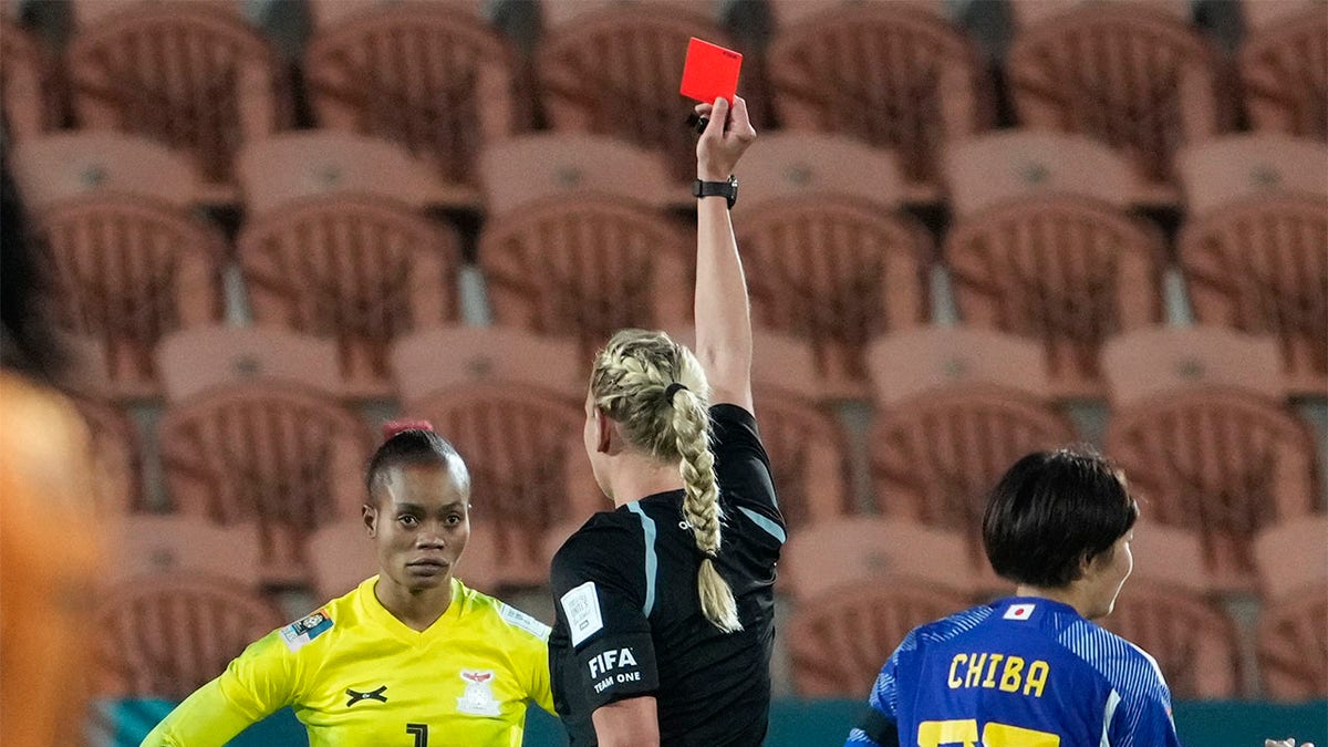 Referee gives red card to Catherine Musonda