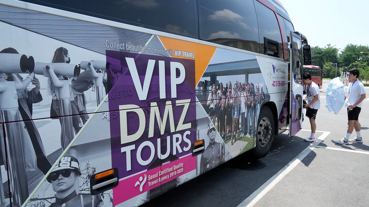 A bus advertises DMZ tours in South Korea