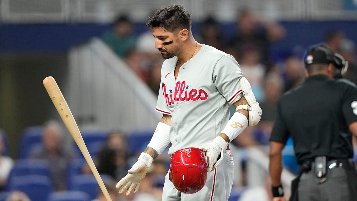 Nick Castellanos tosses bat