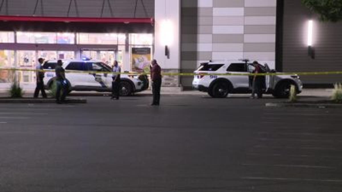 Police inspecting scene outside of TJ Maxx