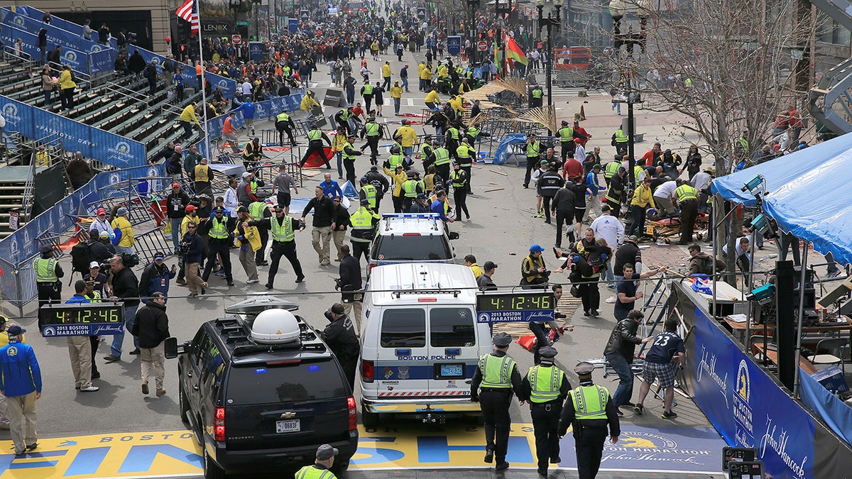 Scene of Boston Marathon finish line with tons of police and emergency vehicles