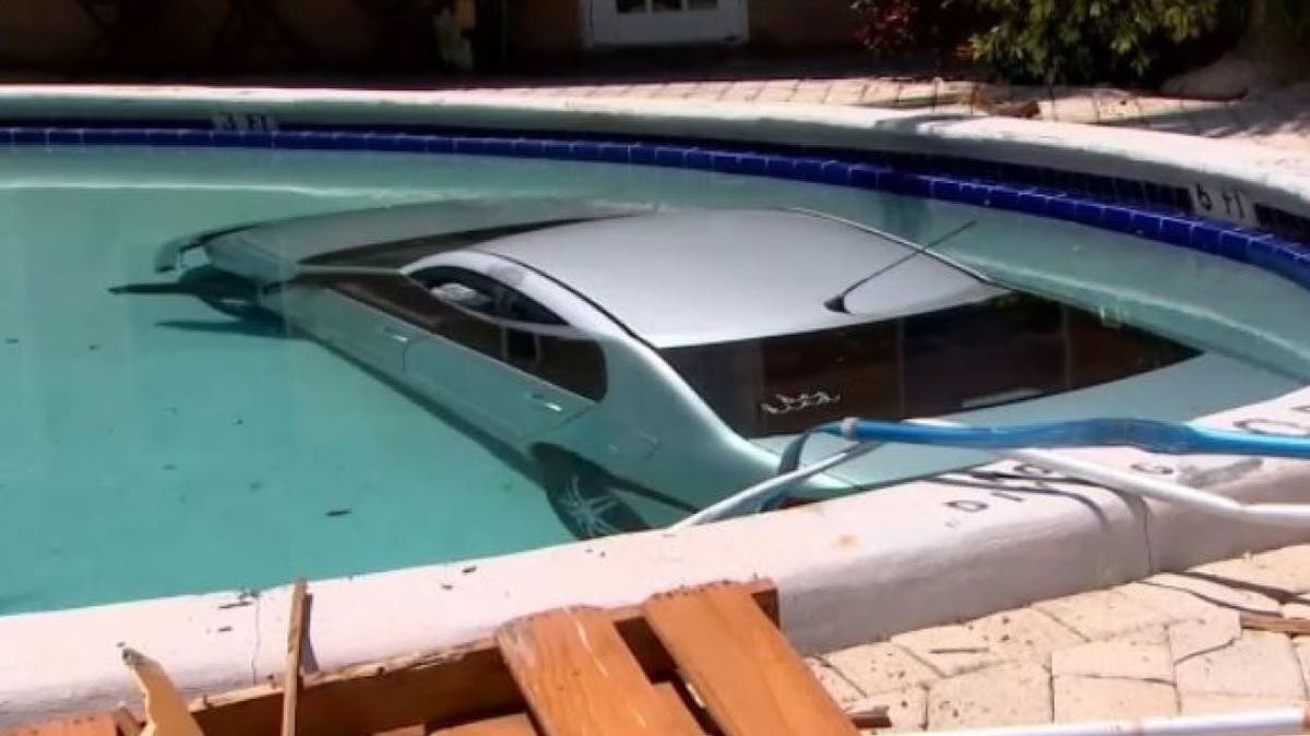 submerged car in Florida pool