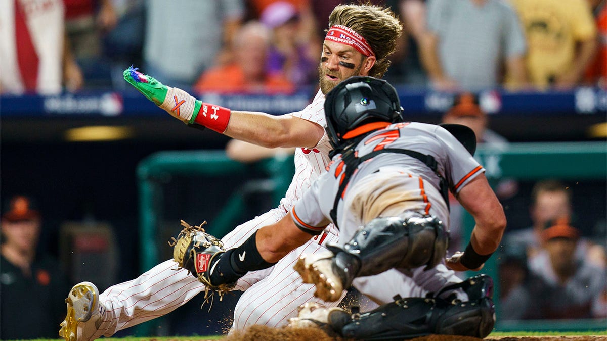 Bryce Harper slides home