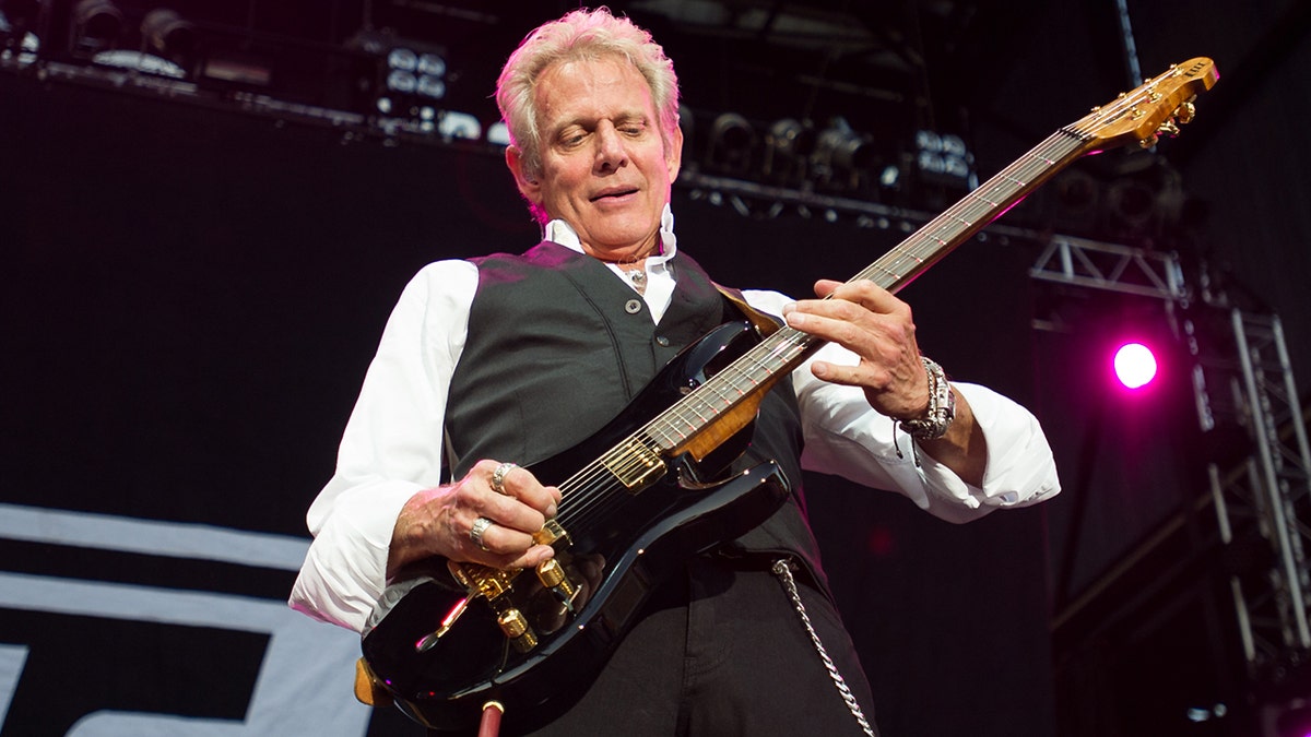Don Felder on stage while on tour with Foreigner in 2014